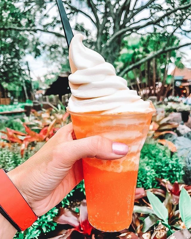 image shows Dole Whip. A frozen pineapple treat served at Magic Kingdom Disney World.